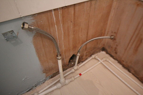 After attaching tap connectors to the pipes